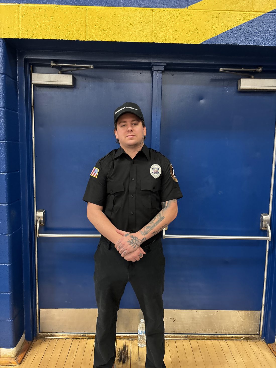 A Hammerhead Security officer standing post